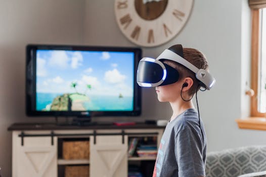 A young boy using a VR headset, fully engaged in a virtual reality experience indoors.